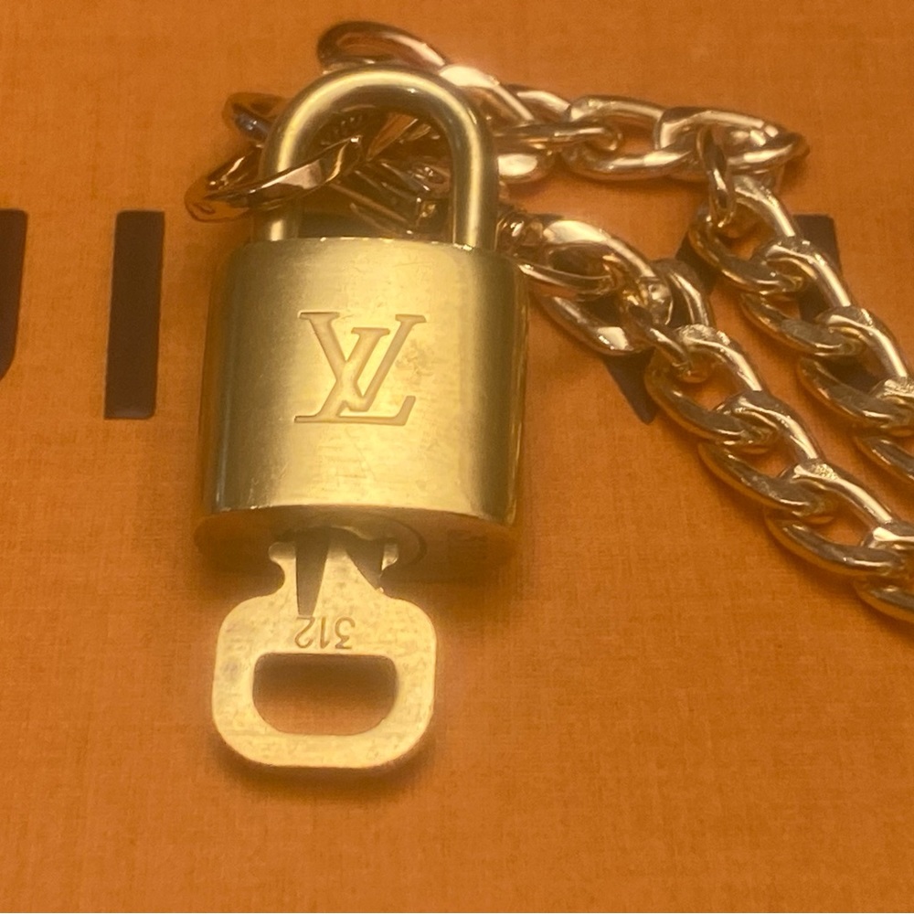 Authentic LV Lock and Key with chain. #312